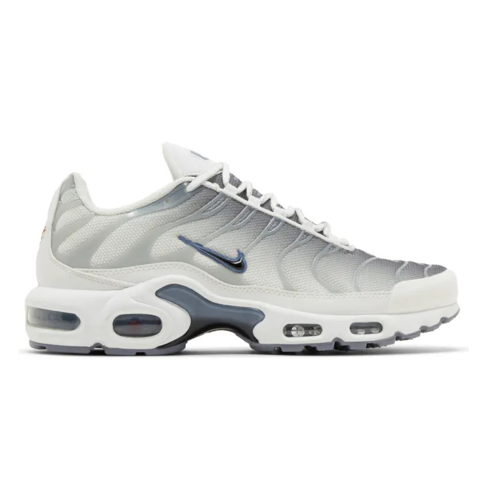 Nike TN Air Max Plus sneaker, light gray upper with white laces and blue swoosh