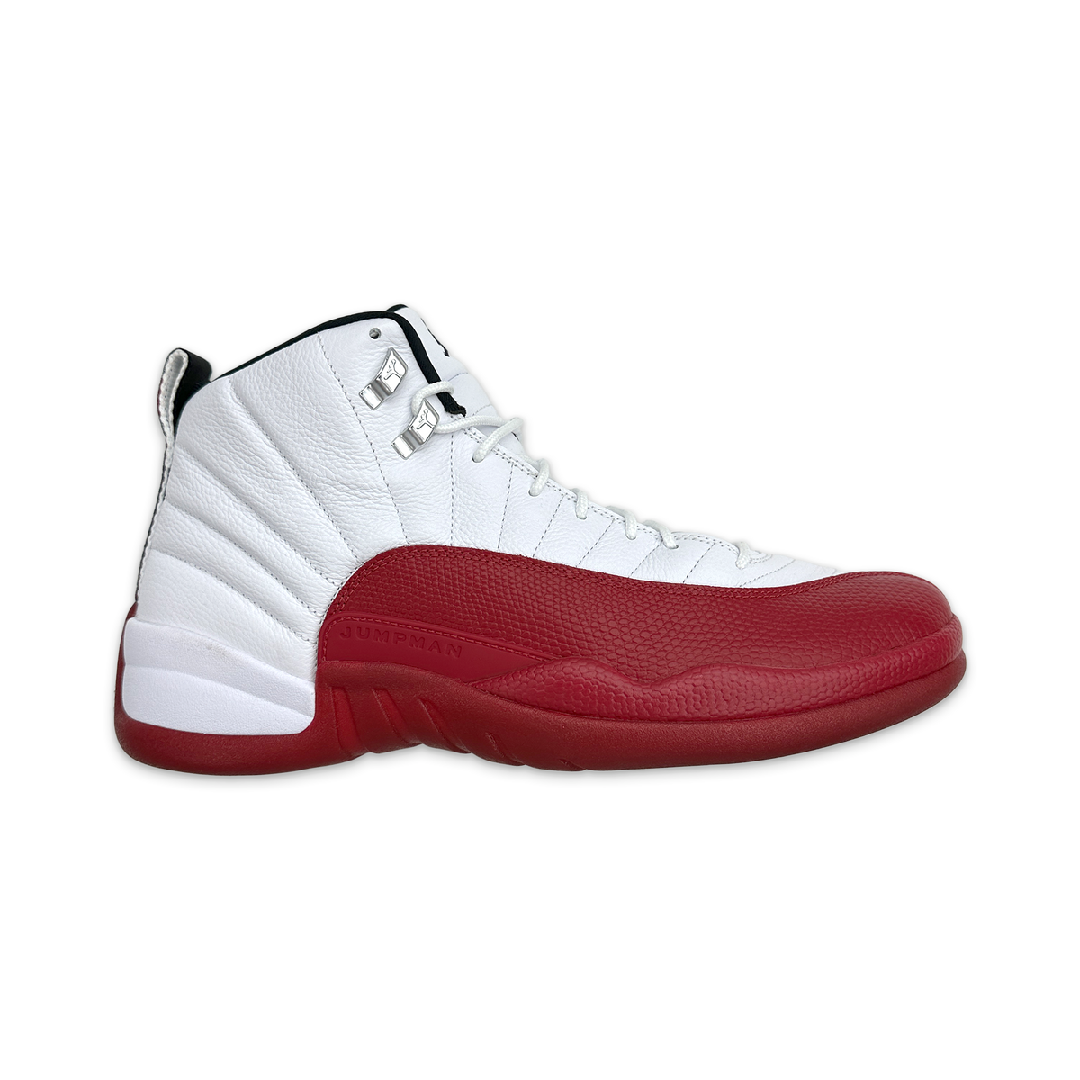 Air Jordan 12 Retro 'Cherry' sneaker with white leather upper and red sole, lace-up