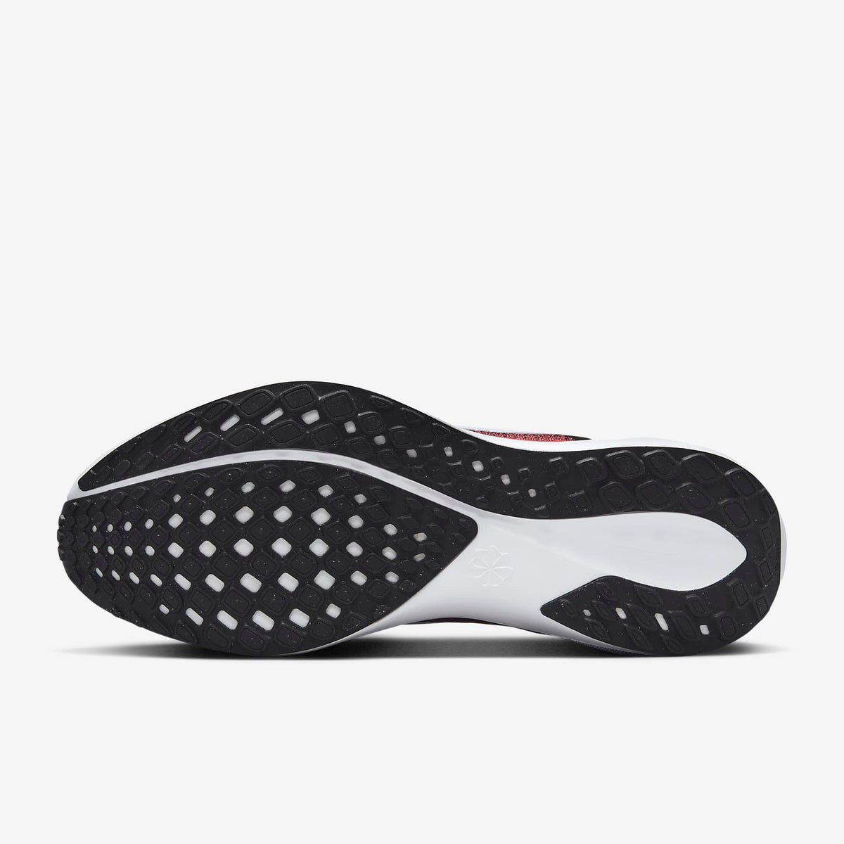 Running shoe outsole with black rubber tread and white midfoot plate