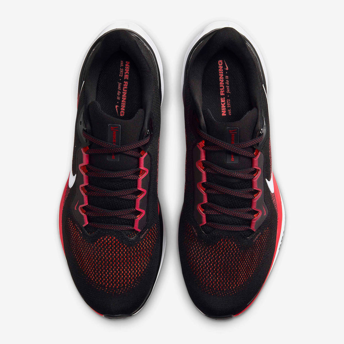 Running shoes with black mesh upper, red laces, and white swoosh