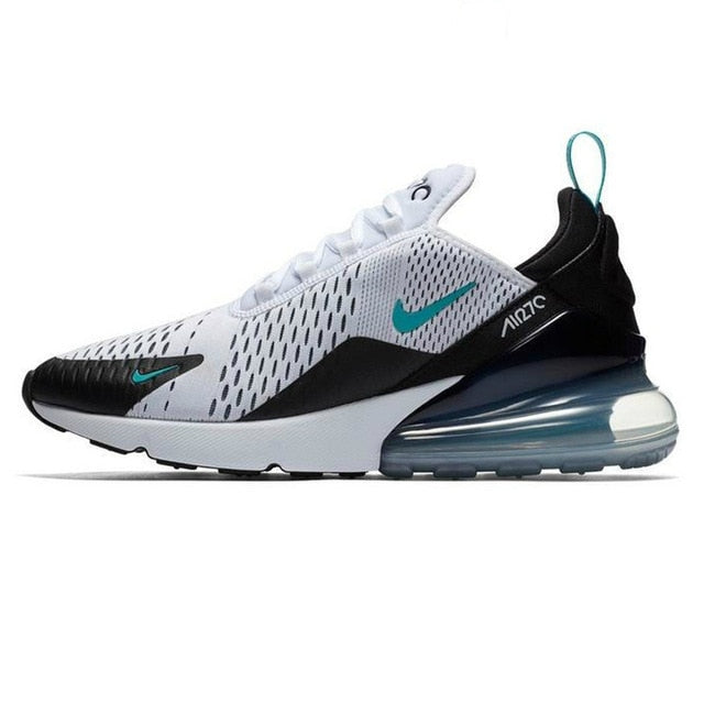Running shoes with mesh upper, white and black colorway, teal swoosh, blue-tinted air sole.