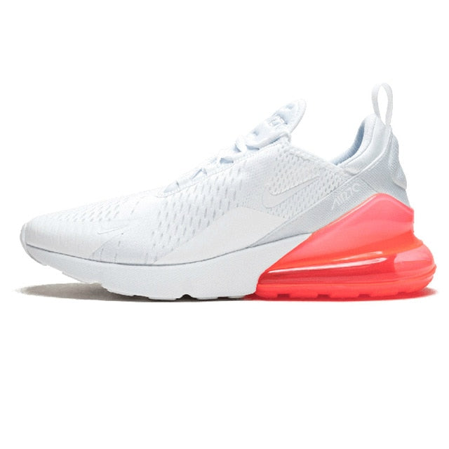 Running shoes with breathable upper, white with pink air sole unit and side logo details.