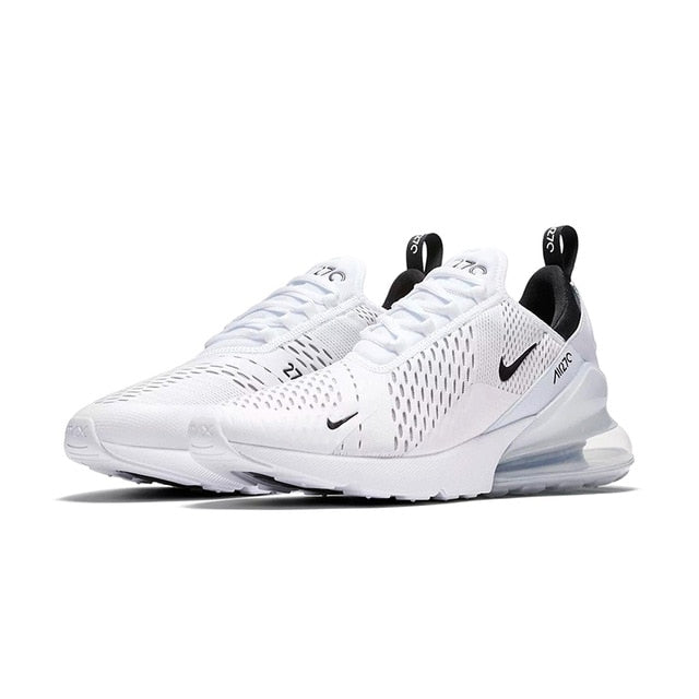 Air Max 270 running shoes in white with black heel tabs and visible Air unit