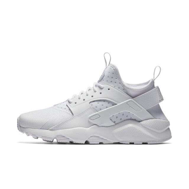 NIKE running shoe in white with textured upper and white midsole
