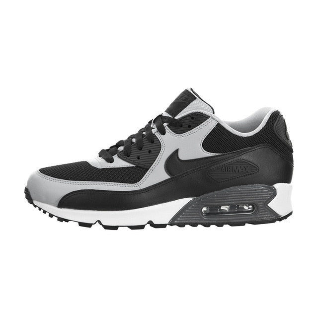 NIKE Air Max 90 running shoes in black, white, and gray with visible Air unit