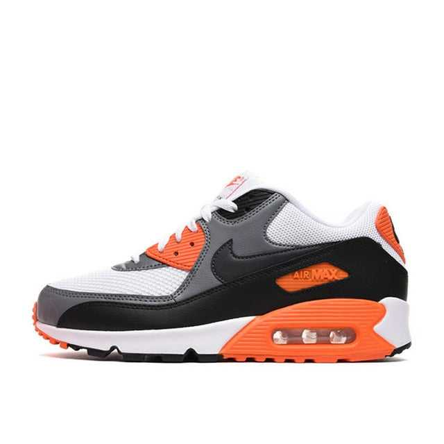 NIKE Air Max 90 running shoes in white with black and orange accents, lace-up