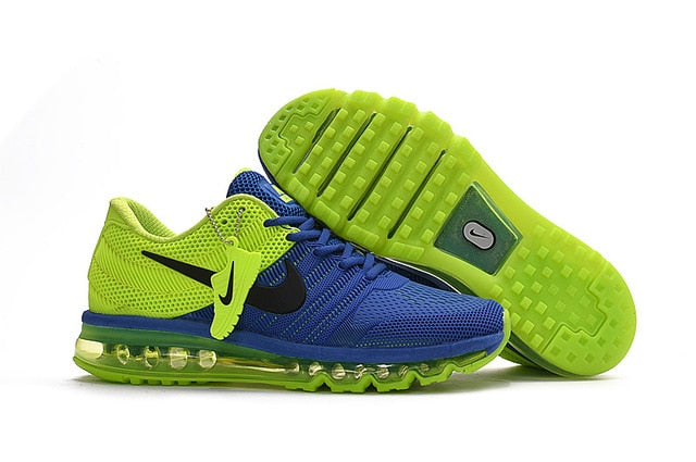 Green and blue running shoes with Nike swoosh and Air-style clear cushioning outsole