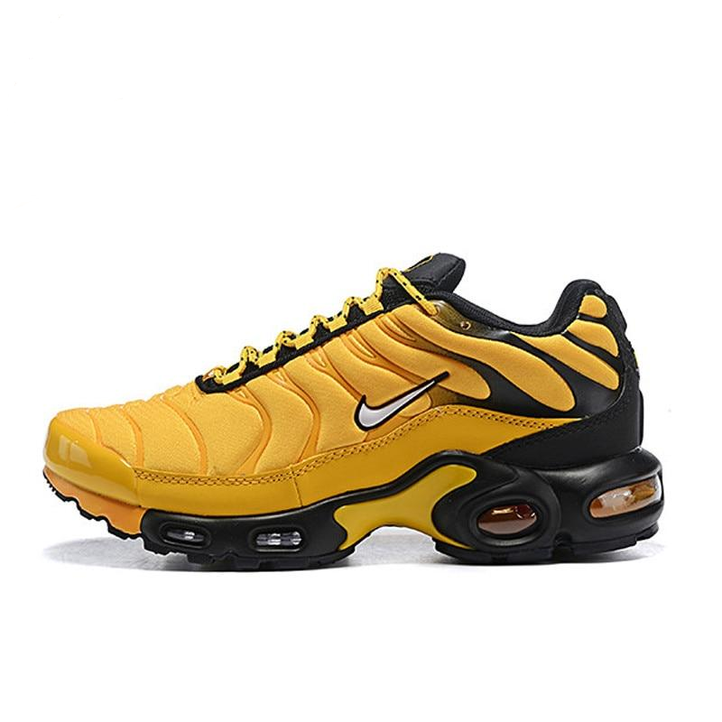 Yellow and black breathable running shoes with Nike swoosh and Air Max pods