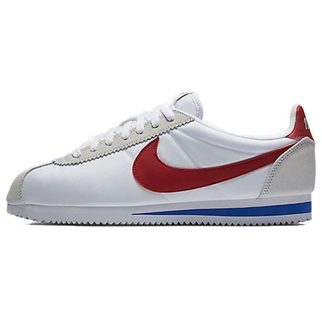 Nike Cortez low-top running shoe with red swoosh, white upper