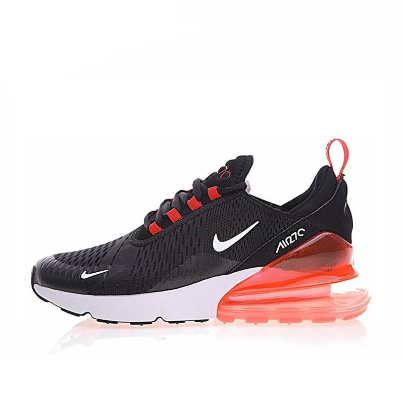 Men's black running shoes with red Air Max-style heel unit and white sole