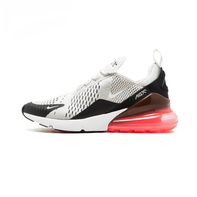 Men's white and black running shoes with red Air Max-style heel unit