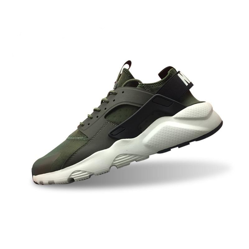 Nike Air Huarache running shoes in olive green with black accents and white sole