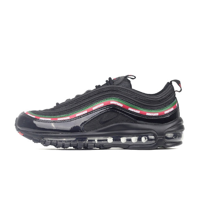 Air Max 97 running shoes in dark gray/black with green-red stripe trim