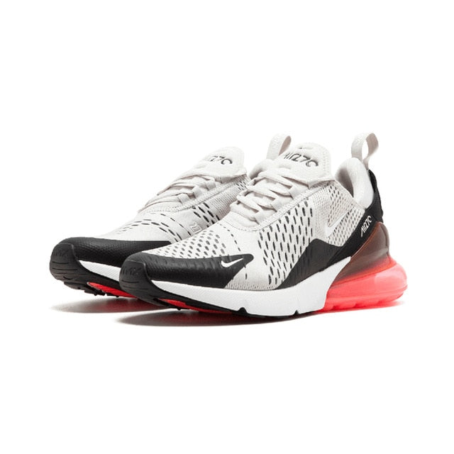 Nike Air Max 270 running shoes, white knit upper with black accents and red air unit