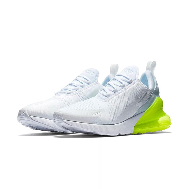 White Nike Air Max 270 running shoes with neon green outsole and breathable knit upper