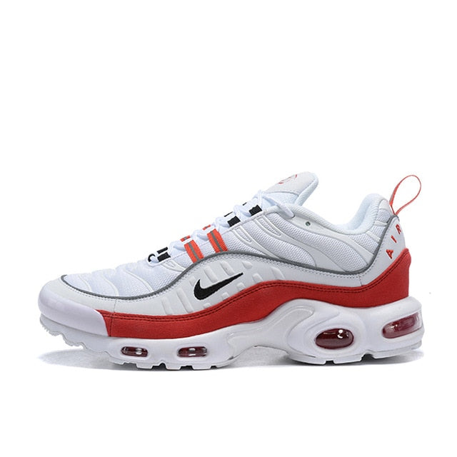 White and red Air unit running shoes with black swoosh and striped laces