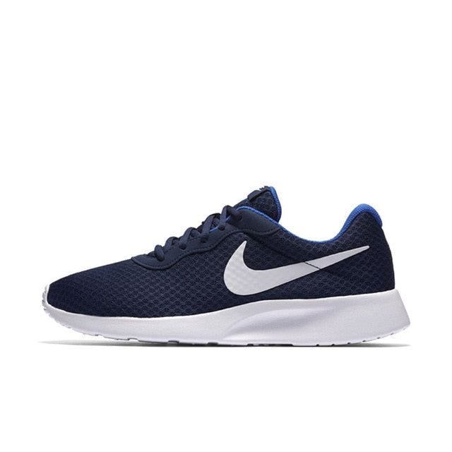 Navy mesh lace-up running shoe with white Swoosh and cushioned sole.