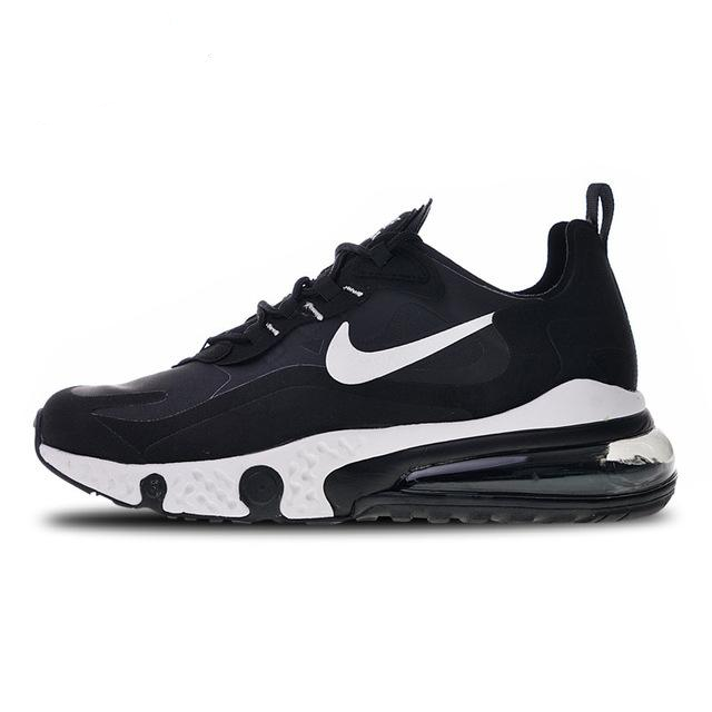 Black running sneakers with white Nike swoosh and visible air sole