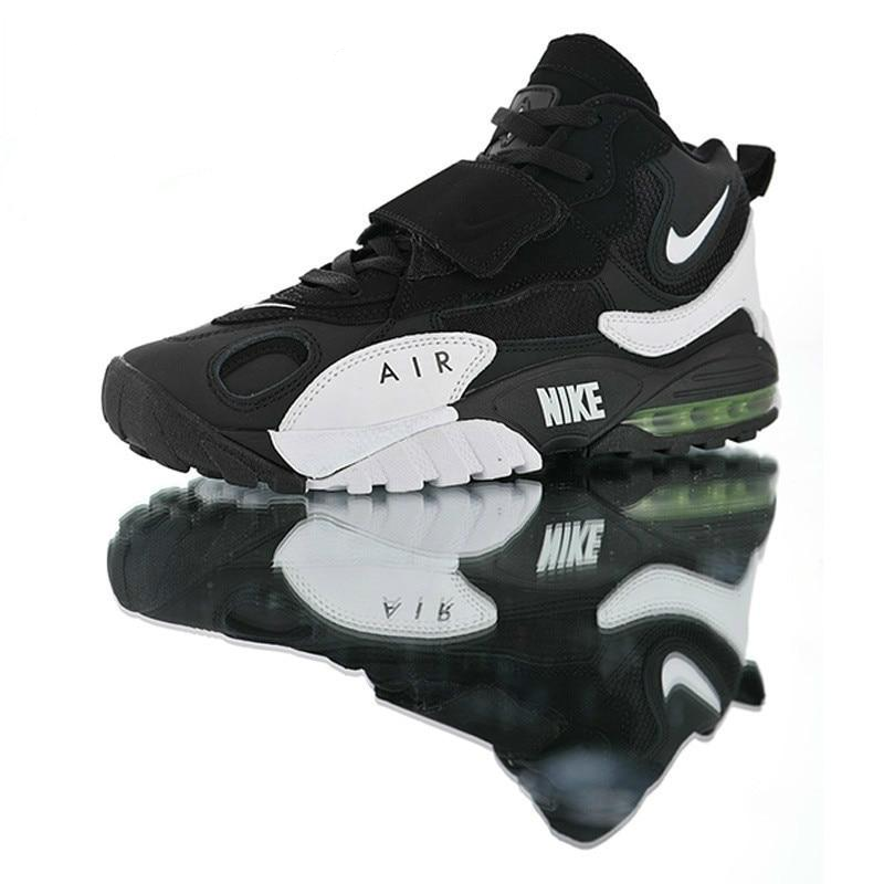 Black and white running sneakers with Nike swoosh, Air window, green-tinted sole unit