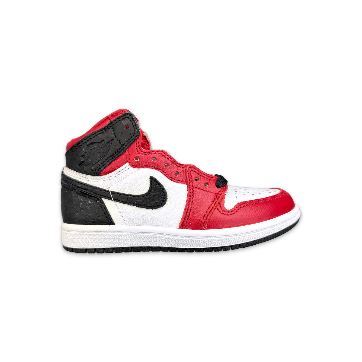 Kids high-top sneakers with black, red, and white panels and textured toe