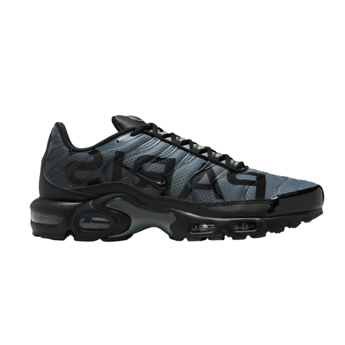 Grey NIKE Air Max Plus lace-up sneaker with patterned upper and visible air pods