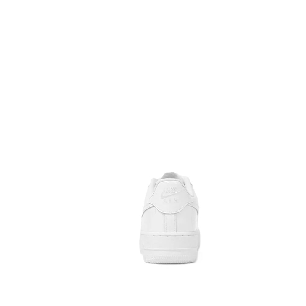 White kids low-top Nike sneaker, heel-toe back view, lace-up